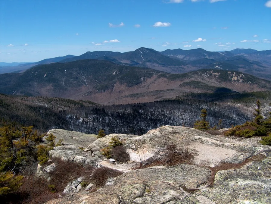 Rugged rocky summit of Mount Chocorua viewed from Carter Ledge in the White Mountains